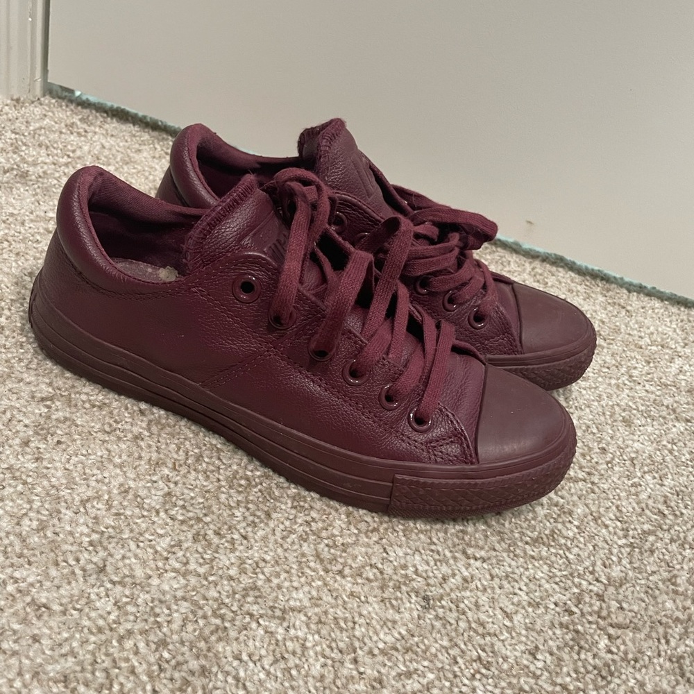 Maroon low top Converse all star leather